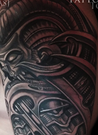 biomechanical tattoo inspired by giger style
